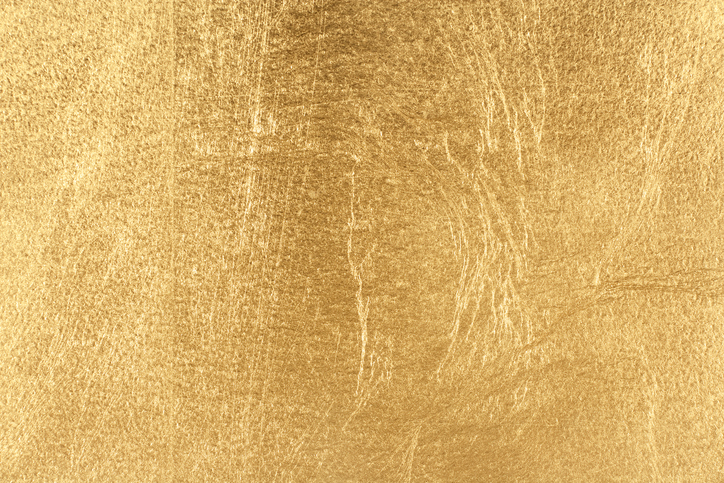 Un papier peint expansé avec une texture rappelant celle de l'or brut